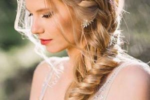 Long wedding day hairstyle boho fishtail braid headpiece