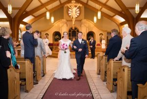 Bride and Groom leave the church