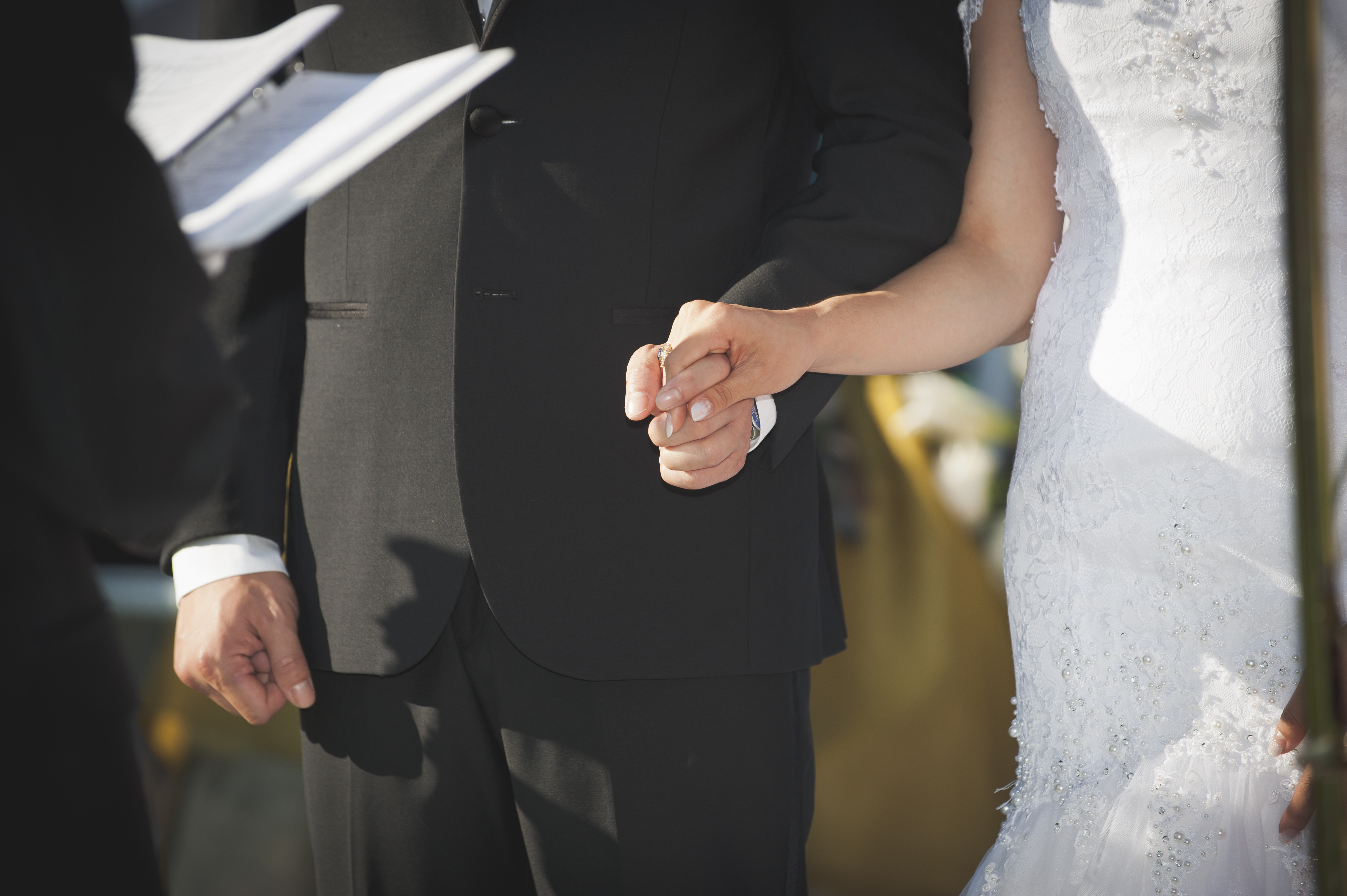 perfect wedding - bride and groom holding hands