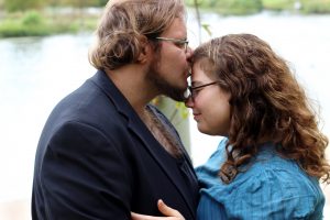 a sweet moment between the bride and groom