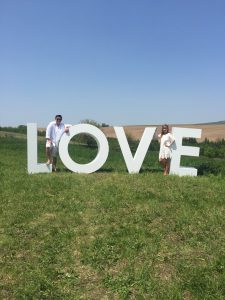 Couple with Love Sign - Lovely Wedding