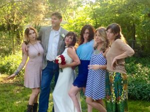 backyard wedding video - couple and family
