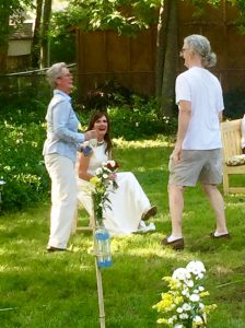 backyard wedding video - bride and guests