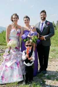 incredibly unique wedding - couple with flower girl, ring bearer, and maid bridesmaid