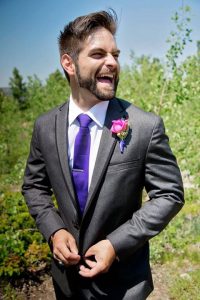 incredibly unique wedding - groom laughing