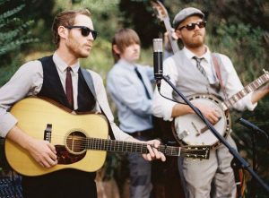 affordable wedding ideas -family sing at ceremony