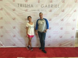 Tampa wedding video - Trisha & Gabriel in front of sign