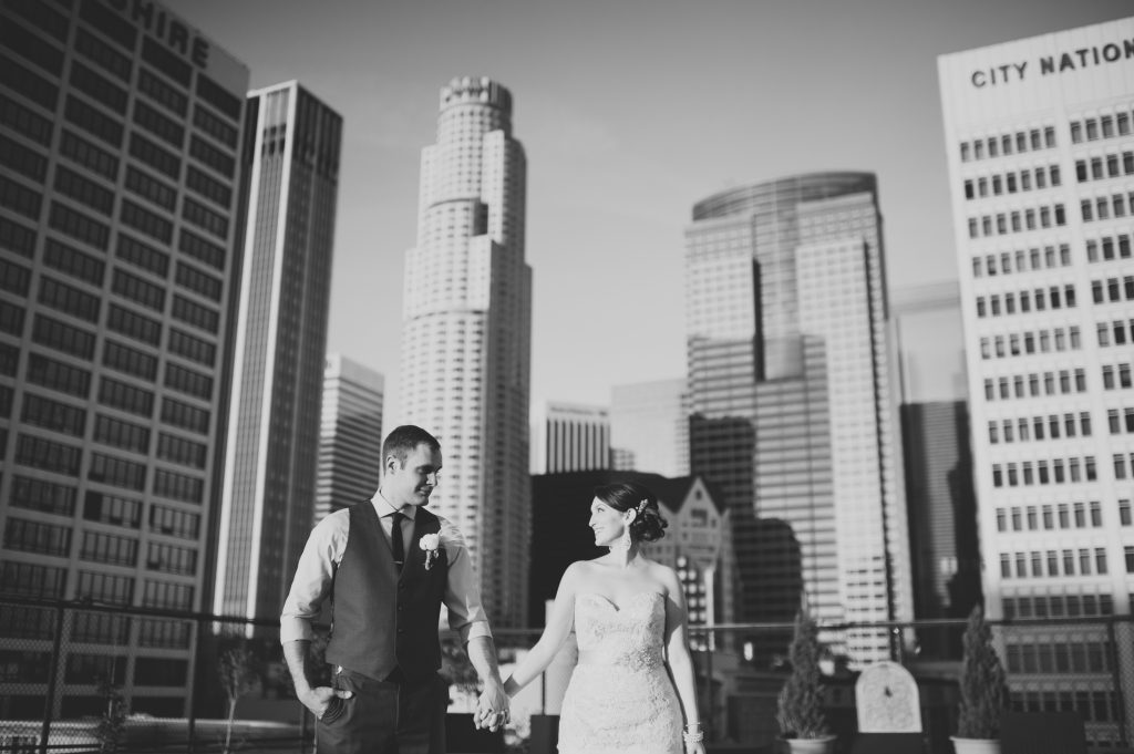 on top of the LA Athletic Club (where the party got ready) with LA skyline... - Heidi Ryder Photography