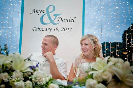 Custom aisle runners can be used as backdrops at the reception