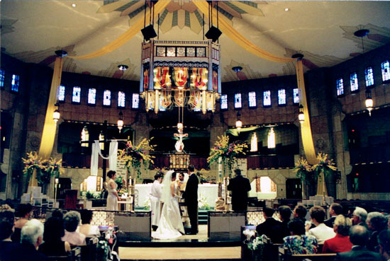 Ring exchange at Shrine of the Little Flower in Royal Oak wedding